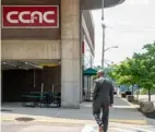  ?? Lucy Schaly/Post-Gazette ?? CCAC President Quintin Bullock walks on the sidewalk on CCAC’s Allegheny campus on May 22.