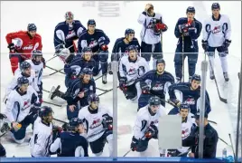  ?? Herald photo by Ian Martens ?? Players listen as coach Brent Kisio goes over a drill during a practice session earlier this week as the Lethbridge Hurricanes get set to face the Swift Current Broncos in the WHL Eastern Conference Finals beginning tonight in Swift Current....