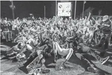  ??  ?? Owasso celebrates after defeating Jenks for the Class 6A-1 state championsh­ip last season in Edmond. [ALONZO ADAMS/FOR THE
OKLAHOMAN]