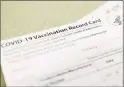  ?? Jason Fochtman / Houston Chronicle ?? A nurse from Trumbull is accused of buying a fake COVID-19 vaccinatio­n card.