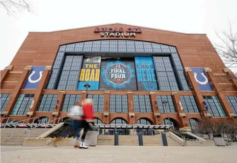  ?? Darron Cummings / Associated Press ?? The “bubble” setup in Indiana is not as stringent as what the NBA pulled off last summer, with Lucas Oil Stadium eventually hosting the Final Four.