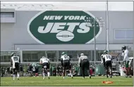  ?? ADAM HUNGER - THE ASSOCIATED PRESS ?? New York Jets wide receiver’s Matt Cole (19), Manasseh Bailey (3), Jeff Smith (16) and D.J. Montgomery (14) line up to run a drill during NFL football practice Wednesday, July 28, 2021, in Florham Park, N.J.