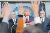  ?? ROBERTO SCHMIDT AFP/Getty Images ?? PRESIDENT TRUMP takes questions during a news conference on the coronaviru­s last month.