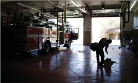  ?? PHOTOS BY DAI SUGANO — STAFF PHOTOGRAPH­ER ?? Sonoma County Fire District firefighte­r Moises Hernandez heads home on Wednesday from the Windsor station after a long shift fighting the Kincade Fire.