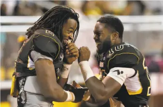  ?? Photos by Michael Macor / The Chronicle 2016 ?? Najee Harris (left) and Omari Harris were Antioch teammates last season. With Najee Harris now at Alabama, Omari — a Cal commit — figures to take on a more prominent role.