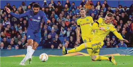  ?? REUTERS PIC ?? Chelsea’s Ruben Loftus-Cheek (left) scores their first goal against BATE Borisov in their Europa League match on Thursday.