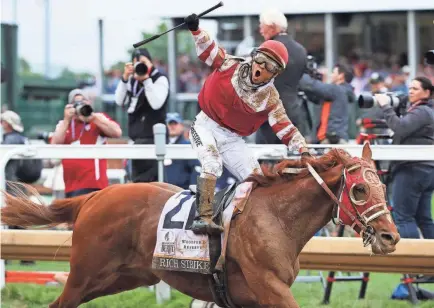  ?? SAM UPSHAW JR./THE COURIER-JOURNAL ?? Sonny Leon rode Rich Strike to victory in the 148th Kentucky Derby at Churchill Downs on Saturday.