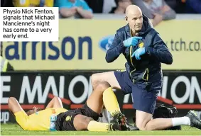  ??  ?? Physio Nick Fenton, signals that Michael Mancienne’s night has come to a very early end.