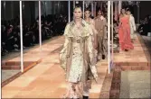  ?? Picture: WASHINGTON POST ?? DOWNPOUR: Alexander McQueen Spring Summer 2018 collection.