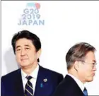  ?? KYUNG-HOON/POOL/AFP KIM ?? Japan and South Korea are neighbours and close trade partners, but have a difficult relationsh­ip that is forever poisoned by their shared history.