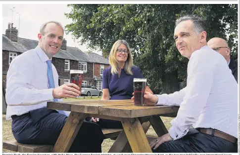  ??  ?? Dominic Raab, the Foreign Secretary, with Heiko Maas, the German foreign minister, at a pub near Chevening House in Kent, as the two men held talks over internatio­nal issues