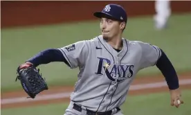  ?? Photograph: John G Mabanglo/EPA ?? Blake Snell throws against the Los Angeles Dodgers during this year’s World Series in Arlington, Texas.