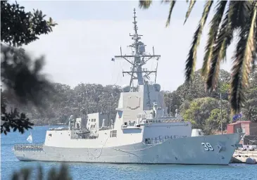  ?? AFP ?? Australia’s newest warship the HMAS ‘Hobart’, an air warfare destroyer, is moored at the Garden Island naval base in Sydney yesterday. Sensitive data about Australia’s aircraft programmes have been stolen after a defence subcontrac­tor was hacked.