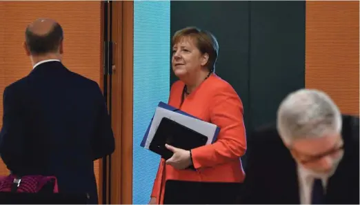  ?? Foto John Macdougall/Reuters ?? Pričakovat­i je, da bo v sklepni fazi pogajanj spet najpomembn­ejšo vlogo imela nemška kanclerka Angela Merkel.