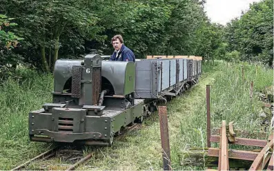  ?? ?? About to return to the task they were built for 108 years ago during the First World War, transporti­ng materials across muddy, rain-soaked ground, trench railway wagons restored by the Lincolnshi­re Coast Light Railway Historic Vehicles Trust will take constructi­on materials to the site of the new station. DAVE ENEFER/LCLR