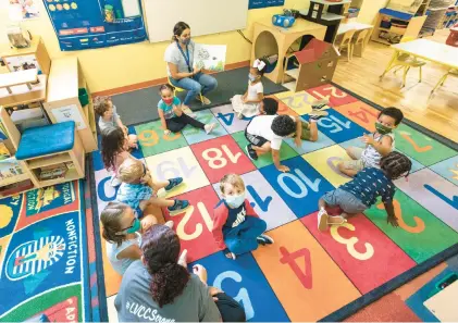  ?? RICH HUNDLEY III/SPECIAL TO THE MORNING CALL ?? Children gather for story time in August 2021 at the Lehigh Valley Children’s Center in Allentown.