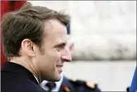  ?? AP PHOTO STEPHANE DE SAKUTIN ?? French President-elect Emmanuel Macron attends a ceremony Monday at the Arc de Triomphe honouring the end of World War II. Prime Minister Justin Trudeau has spoken with Emmanuel Macron to congratula­te him on his election as the next president of France.