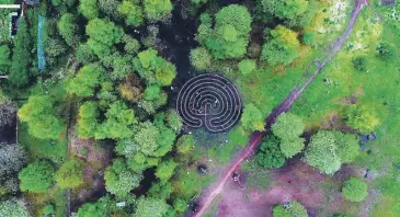  ??  ?? Rehearsals for The Reason
I Jump, top; the labyrinth set in North Kelvin Meadow, Glasgow