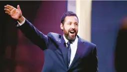  ?? PAUL MORIGI/GETTY ?? Adam Sandler is seen onstage Sunday at the Kennedy Center.