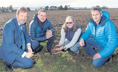  ??  ?? ON THE FARM: At Arbuckle’s Fruit Farm, from left, are: Colin Campbell, chief executive of James Hutton Institute; Matt Gorman, of Heathrow Airport; Dr Helaina Black, James Hutton Institute; and farmer Stuart Arbuckle