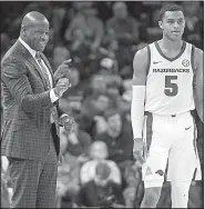  ?? NWA Democrat-Gazette/BEN GOFF ?? Arkansas guard Jalen Harris (right) could be the nation’s leader in assists, according to Razorbacks Coach Mike Anderson. “All he has got to do is trust those other guys and they have to move without the basketball and we have got to keep the tempo up,” Anderson said.