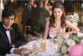  ??  ?? This image released by Fox Searchligh­t Pictures shows Tony Revolori, left, and Anna Kendrick in a scene from “Table 19.”