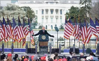  ?? Jacquelyn Martin / Associated Press file photo ?? On Jan. 6, with the White House in the background, President Donald Trump speaks at a rally in Washington. President Joe Biden has agreed to a request from Congress seeking sensitive informatio­n on the actions of Republican Donald Trump and his aides during the Jan. 6 insurrecti­on, though the former president claims the informatio­n is guarded by executive privilege.