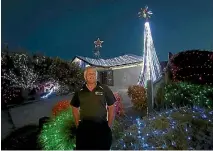  ??  ?? Mark Peek put up 53,000 lights at his home, which took him about six weeks.