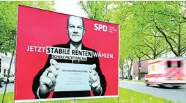  ?? REUTERS ?? Cartel electoral del candidato del SPD a las elecciones federales del 26 de septiembre, Olaf Scholz