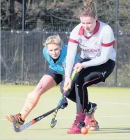  ?? Rachel Jackson ?? Roisin Pickering closes a Glossop opponent down during the Ladies’ 3-1 win