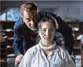  ?? — GSC Movies ?? Yam (left) plays the big bad, seen here with newcomer Li Xuan.