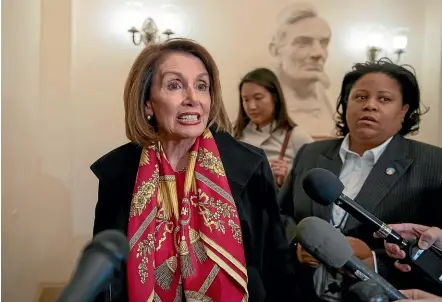  ??  ?? Speaker of the House Nancy Pelosi, D-Calif., responds to reporters after officially postponing President Donald Trump’s State of the Union address until the government is fully reopened.