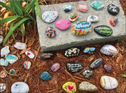  ?? WENDY GALLACHER VIA AP ?? This undated photo provided by Wendy Gallacher shows a selection of painted kindness rocks in Fayette County, Ga., which are part of the local Fayette Rocks Kindness Project.