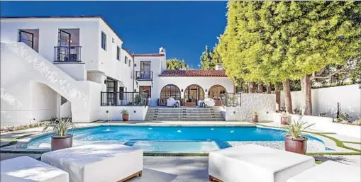  ?? Luke Gibson ?? THE 1929 HOME previously owned by Mitzi Gaynor for decades was renovated and expanded. It sold for $10.3 million last month.