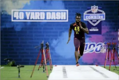  ?? DARRON CUMMINGS — ASSOCIATED PRESS ?? Florida defensive lineman Jachai Polite runs the 40-yard dash during the NFL combine in Indianapol­is.