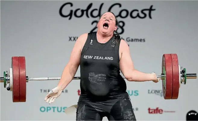  ?? PHOTO: GETTY IMAGES ?? New Zealand’s Laurel Hubbard reacts as she drops the bar and injures her left elbow during the women’s weightlift­ing +90kg final. The injury forced Hubbard to withdraw from the competitio­n.