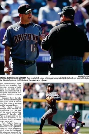  ?? ASSOCIATED PRESS ?? ARIZONA DIAMONDBAC­KS MANAGER Torey Lovullo (left) argues with second base umpire Fieldin Culbreth over a call while facing the Colorado Rockies in the fifth inning of Thursday’s game in Denver.