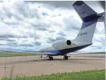  ?? RICK ROMELL / MILWAUKEE JOURNAL SENTINEL ?? An airplane that is speculated to be the private plane of Foxconn chairman Terry Gou is seen at Mitchell Internatio­nal Airport on Monday.