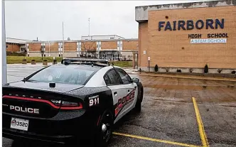 ?? MARSHALL GORBY/STAFF ?? Two middle school students were arrested and charged with making threats that prompted a lockdown at Fairborn High School on Thursday. “The lockdown was due to a social media post that indicated Fairborn High School students and teachers were possibly...
