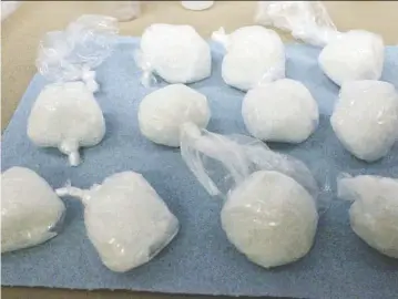  ??  ?? A joint investigat­ion by Red Deer RCMP and Sylvan Lake RCMP has broken up a drug-traffickin­g operation and led to the seizure of meth, cocaine and fentanyl.