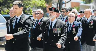  ?? WERNER HILLS ?? PROUDLY MARCHING: Moths march into position at the joint remembranc­e parade the organisati­on and the Nelson Mandela Bay Municipali­ty held on Sunday, which was Remembranc­e Day, in Walmer. A wreath-laying ceremony also took placePictu­re: