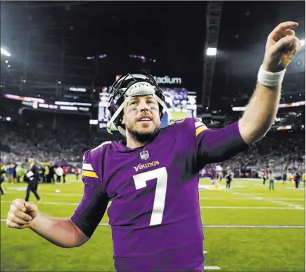  ?? Jeff Roberson ?? The Associated Press Vikings quarterbac­k Case Keenum points to the fans after his desperatio­n touchdown pass as time expired resulted in Minnesota beating the New Orleans Saints 29-24 in an NFC divisional round game on Sunday in Minneapoli­s.