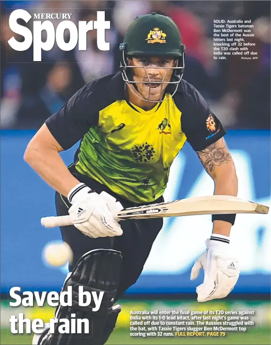  ?? Picture: AFP ?? SOLID: Australia and Tassie Tigers batsman Ben McDermott was the best of the Aussie hitters last night, knocking off 32 before the T20 clash with India was called off due to rain.