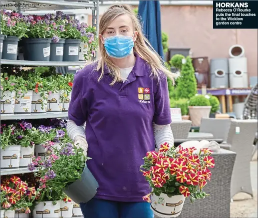  ??  ?? HORKANS Rebecca O’Rourke puts the final touches to the Wicklow garden centre