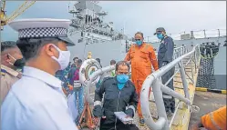  ?? PRATIK CHORGE/HT PHOTO ?? Crew members of barge P305 come out of INS Kochi, on Wednesday.