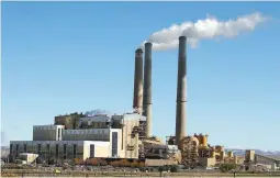  ??  ?? NO TO OBAMA PLAN – Emissions rise from the smokestack­s of Pacificorp’s 1440-megawatt coal-fired power plant in this photo taken Monday in Castle Dale, Utah. Inset photo shows United States Environmen­tal Protection Agency (EPA) Administra­tor Scott...