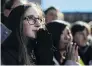  ?? PHOTO: REUTERS ?? Supporters listen as Senator Elizabeth Warren launches her campaign for the 2020 Democratic presidenti­al nomination yesterday.