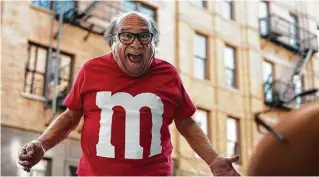  ?? M&M’s ?? Danny DeVito portrays a human M&M in the company’s Super Bowl ad. Marketers are paying more than $5 million per 30-second spot to capture the attention of more than 110 million viewers.