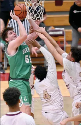  ?? PILOT PHOTO/BEV HARAMIA ?? Bremen’s Baylor Orcutt tries to get a last-second shot up but is slowed down by a host of Jimtown defenders. No foul was called on the play and the Lions lost by one.