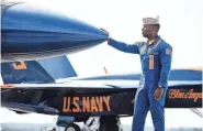  ?? ?? Blue Angel lead solo pilot Lt. Cmdr. Julius “Whiskers” Bratton flew his final air show with the team Nov. 4 over Naval Air Station Pensacola.